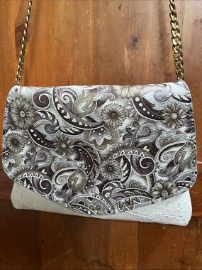 Unique leather crossbody bag with chain